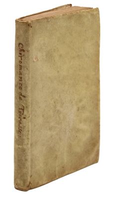 a close up of a book on a white surface with a white background