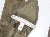 a pair of shoes that are next to a tool bag