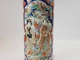 a vase with a picture of a woman and a man on it