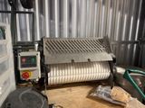 a machine that is sitting on a table in a room