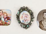 three miniature pictures of a woman and a child on a white surface