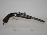 an old gun on display on a clear acrylic stand