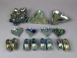 many different pieces of glass that are on the table