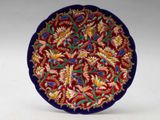 l'image d'une assiette décorative ornée de fleurs