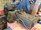 a table with a bunch of old appliances on it