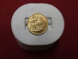 an image of a gold coin sitting on top of a white box