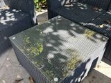 an image of a patio setting with wicker furniture