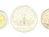 three different types of coins are shown on a white surface