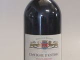 a bottle of wine that is sitting on a table