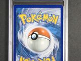 a close up of a pokemon card in a plastic case