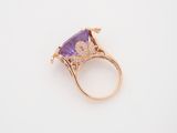 an amethorate and diamond ring set in 18k yellow gold