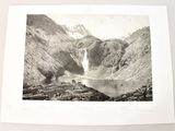 an old black and white photo of a mountain lake with a waterfall