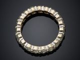 a close up of a gold ring on a black surface