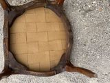 a picture of a wooden turtle frame on the ground