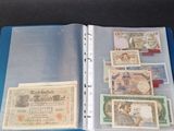 a blue folder with a lot of money inside of it