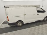 a picture of a white van parked in a garage