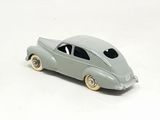 a toy car that is sitting on a white surface