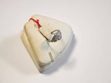 a ring that is sitting on top of a white box