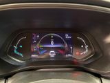 the dashboard of a car with a digital display on it