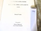 a book with a piece of paper on top of it