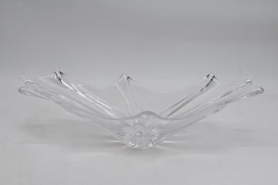 clear glass bowl on a white table with a white background