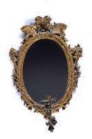 Paire de miroirs de forme ovale en bois mouluré sculpté et d… (photo 2)