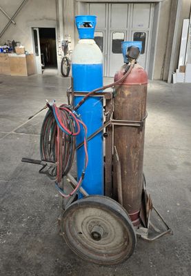 une image représentant un chariot de transport de butane sur lequel se trouve une bouteille de butane