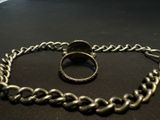 a ring on a chain with a chain around it