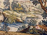 a picture of a tapestry with a picture of birds in the background