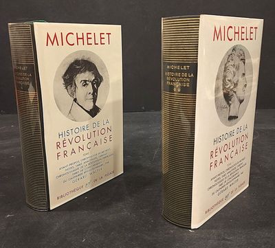 two books on a table with a picture of a man and a woman on the covers