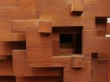a sculpture made out of wood blocks on a table