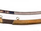 three different types of swords on display on a white surface