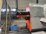 a machine that is working on a piece of metal