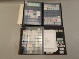 a lot of stamps on the pages of a binder