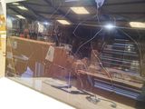 a picture of a broken tv screen in a room