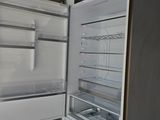 an open refrigerator with the door open and the freezer door open