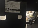 a close up of the back of a machine with a label on it