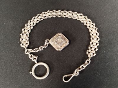 a close up of a chain bracelet with a padlock on it