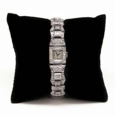 an image of a diamond bracelet on a pillow