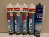several different types of sealant are lined up on a shelf