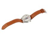 a close up of a watch on a white background