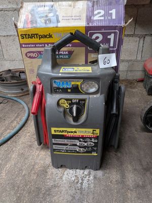 une photo d'un compresseur d'air portable dans un garage