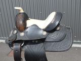 a saddle that is sitting on the ground