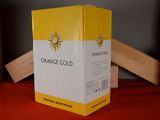 a box of orange gold wine sitting on a table