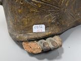 a close up view of a bronze statue of a man ' s foot