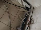 a picture of a bathroom with a toilet and a shower