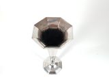 an image of a silver metal object on a white surface