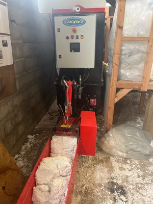 une image d'une machine qui se trouve dans une pièce