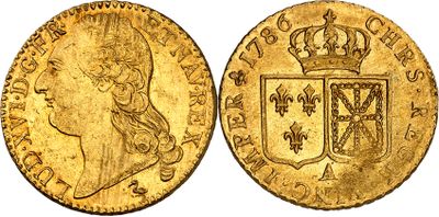 une pièce souveraine en or surmontée d'une couronne