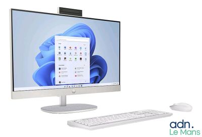 a desktop computer with a keyboard and mouse on the desk